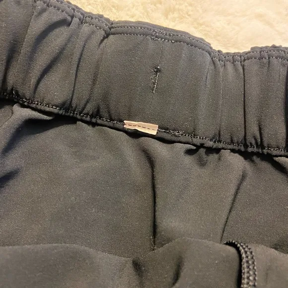LuluLemon on the fly woven black drawstring skirt size 4 style W8897S